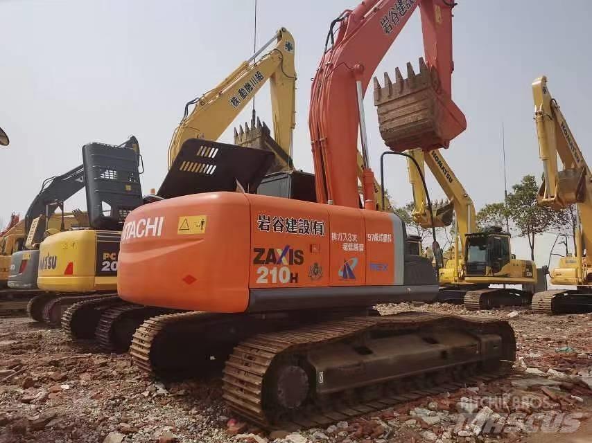Hitachi ZX 210 Гусеничні екскаватори