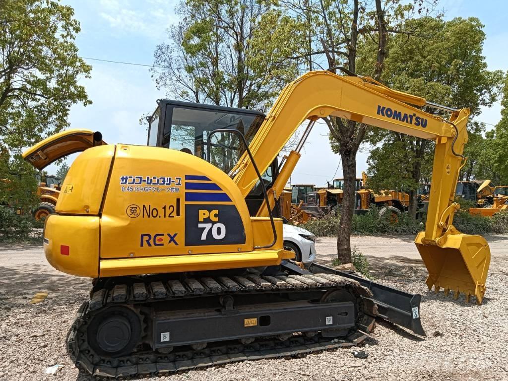 Komatsu PC 70 Середні екскаватори 7т. - 12т.