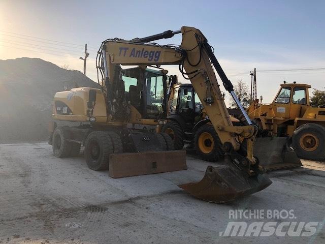 CAT M 315 D Колісні екскаватори