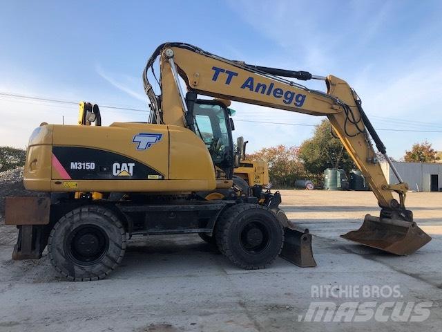 CAT M 315 D Колісні екскаватори