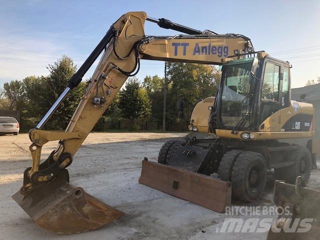 CAT M 315 D Колісні екскаватори