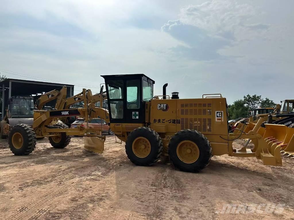 CAT 140K Грейдери