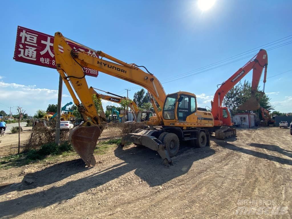 Hyundai 210w Колісні екскаватори