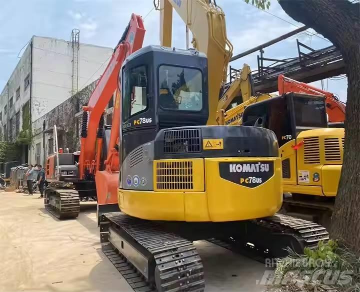 Komatsu PC78US Середні екскаватори 7т. - 12т.