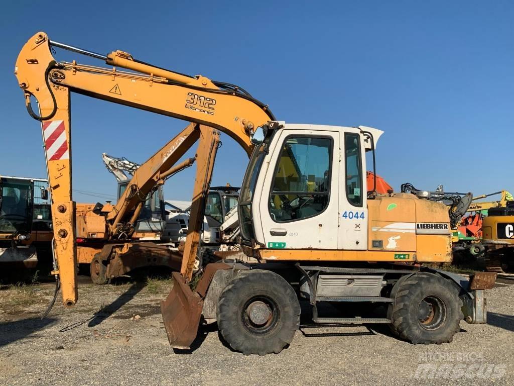 Liebherr A 312 Колісні екскаватори
