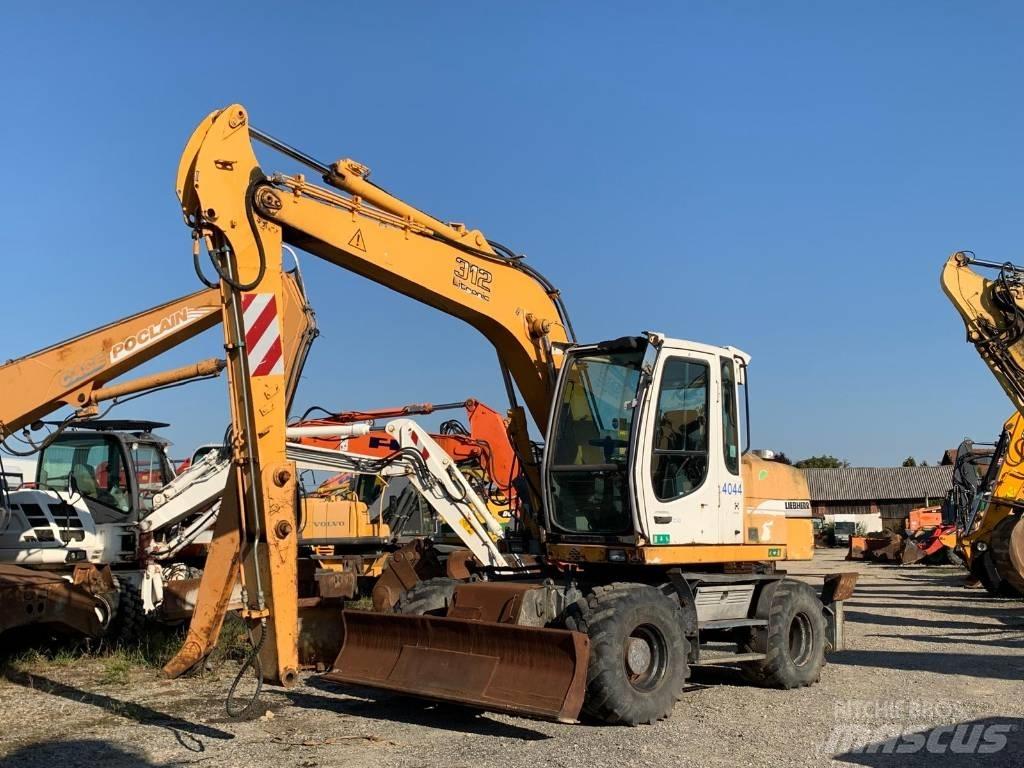 Liebherr A 312 Колісні екскаватори
