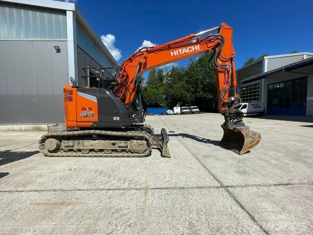 Hitachi ZX135US Гусеничні екскаватори