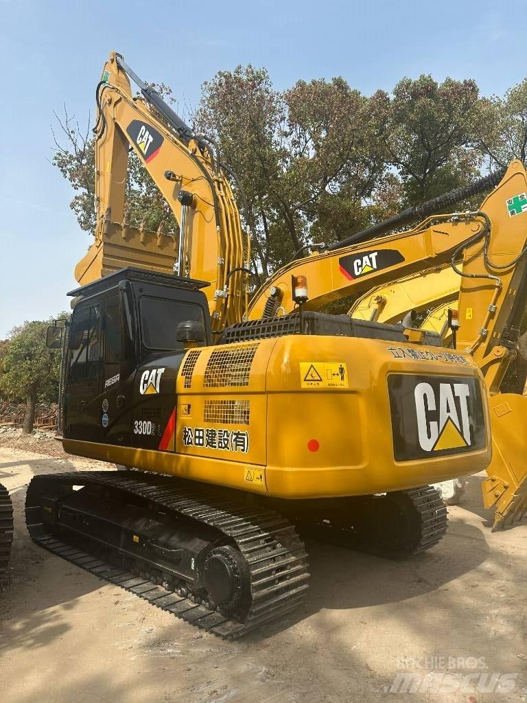 CAT CAT330 Середні екскаватори 7т. - 12т.