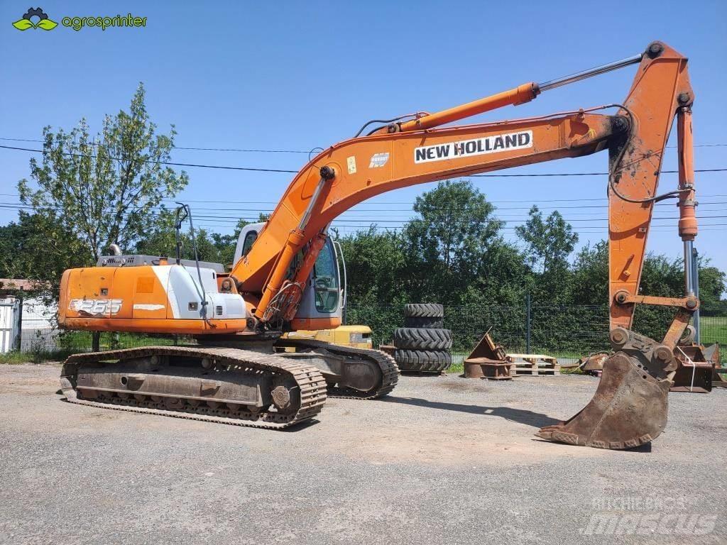 New Holland E 265 Гусеничні екскаватори