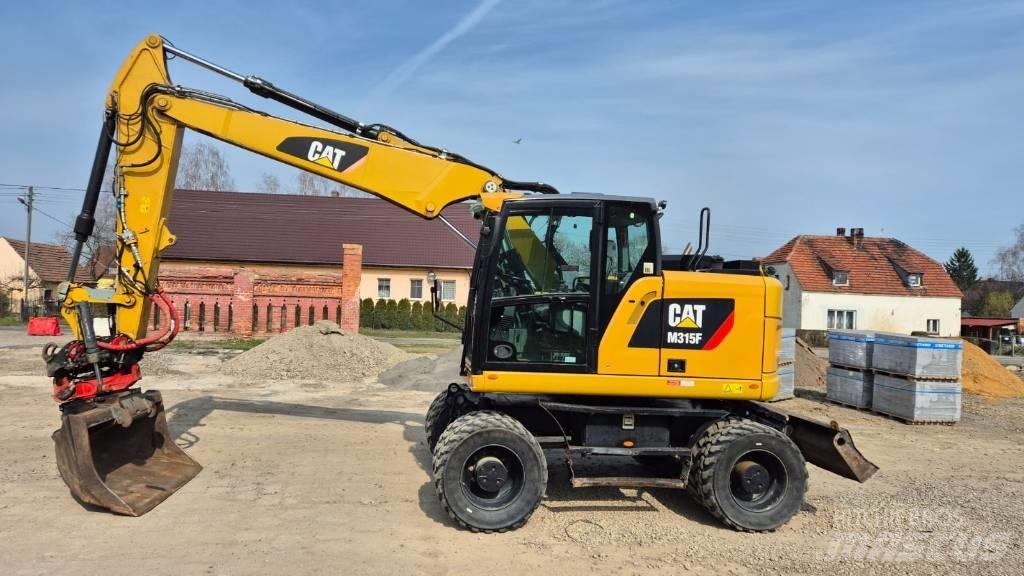CAT M 315 F Колісні екскаватори