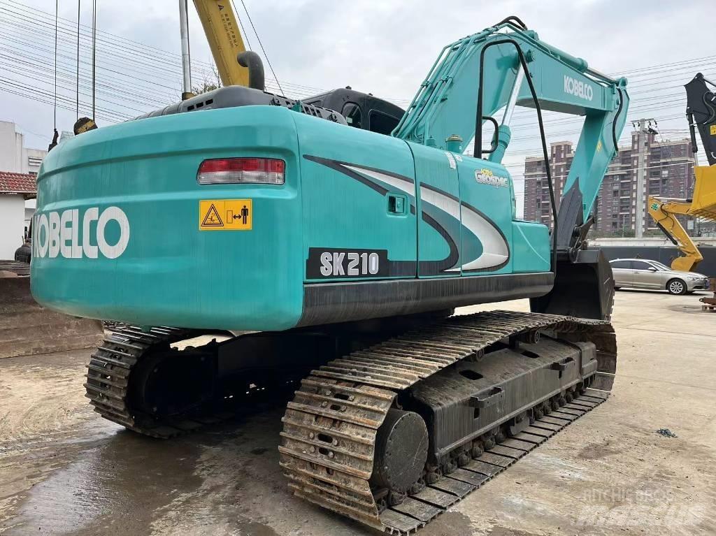 Kobelco SK 210 Гусеничні екскаватори