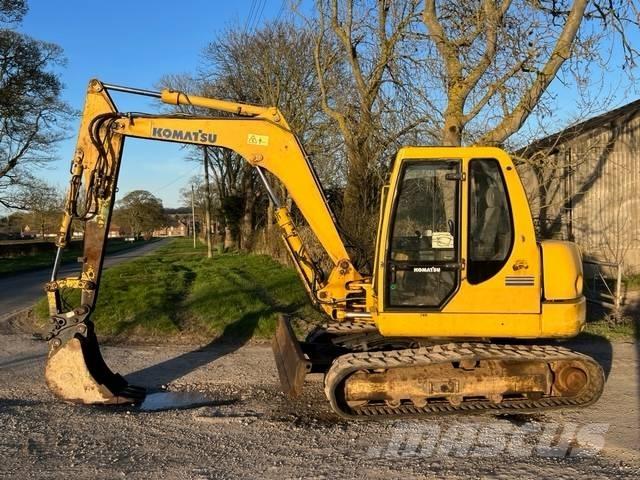 Komatsu PC 75 R Середні екскаватори 7т. - 12т.