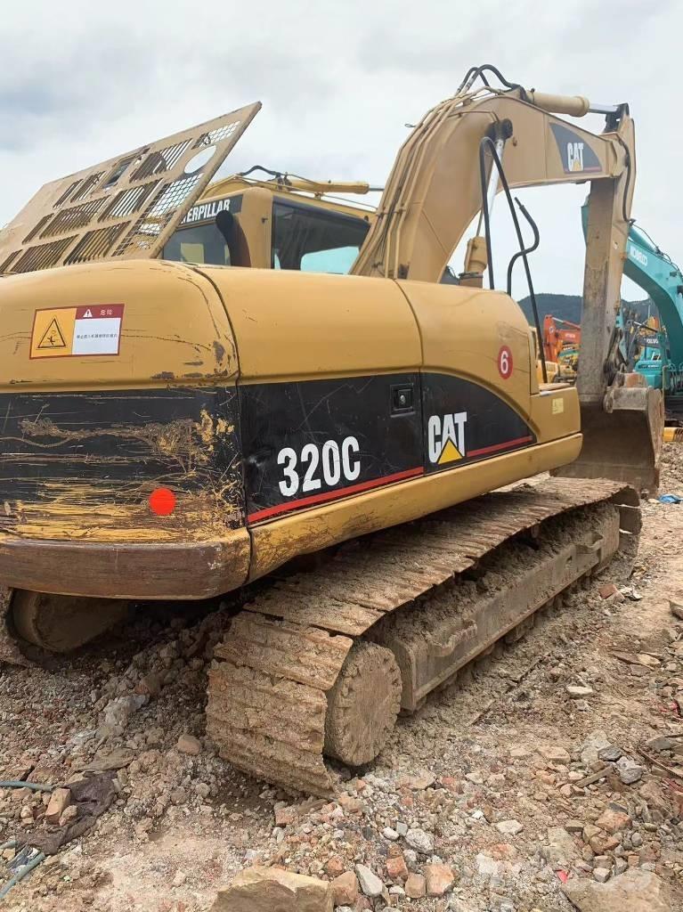 CAT 320 C Гусеничні екскаватори