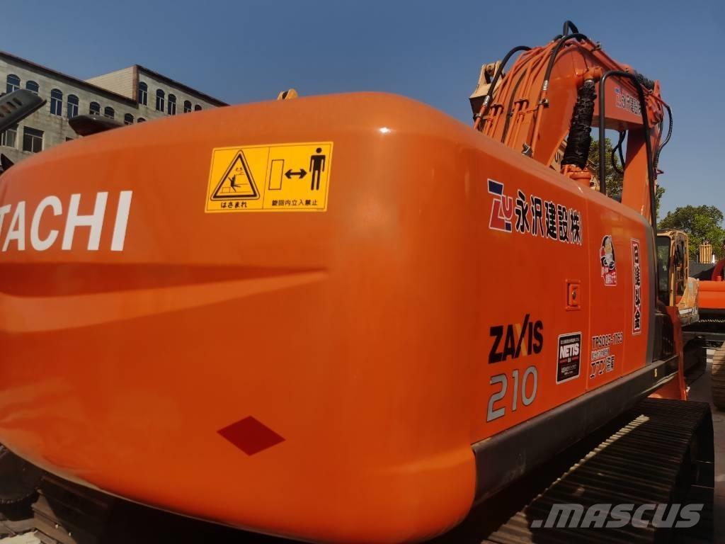 Hitachi ZX 210 Гусеничні екскаватори