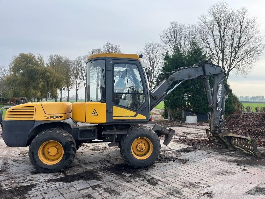 Mecalac 12 MXT Екскаватори-навантажувачі