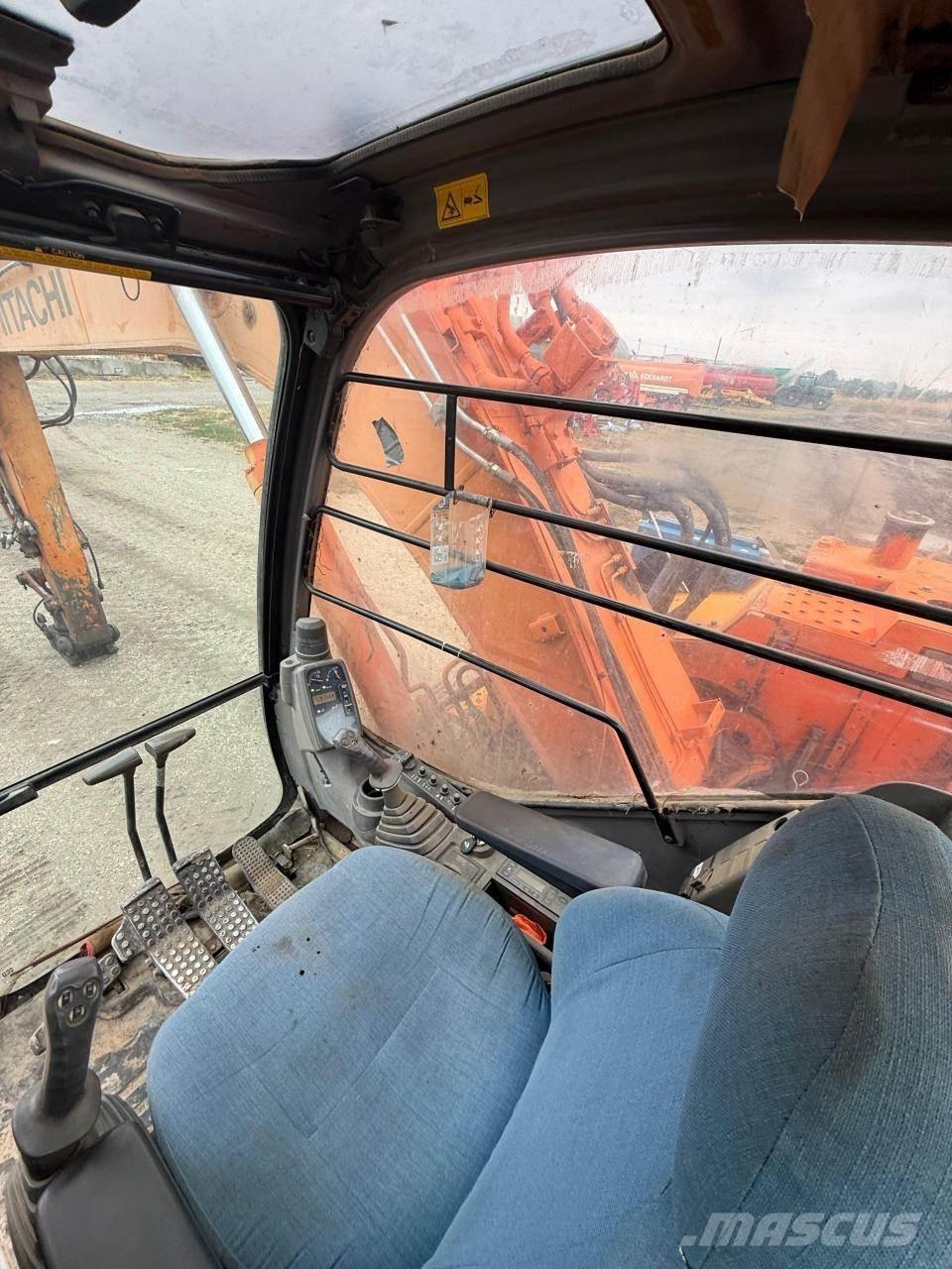 Hitachi ZX135US Гусеничні екскаватори