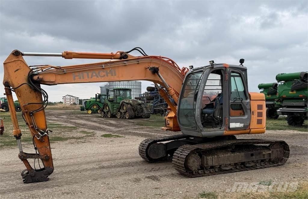 Hitachi ZX135US Гусеничні екскаватори