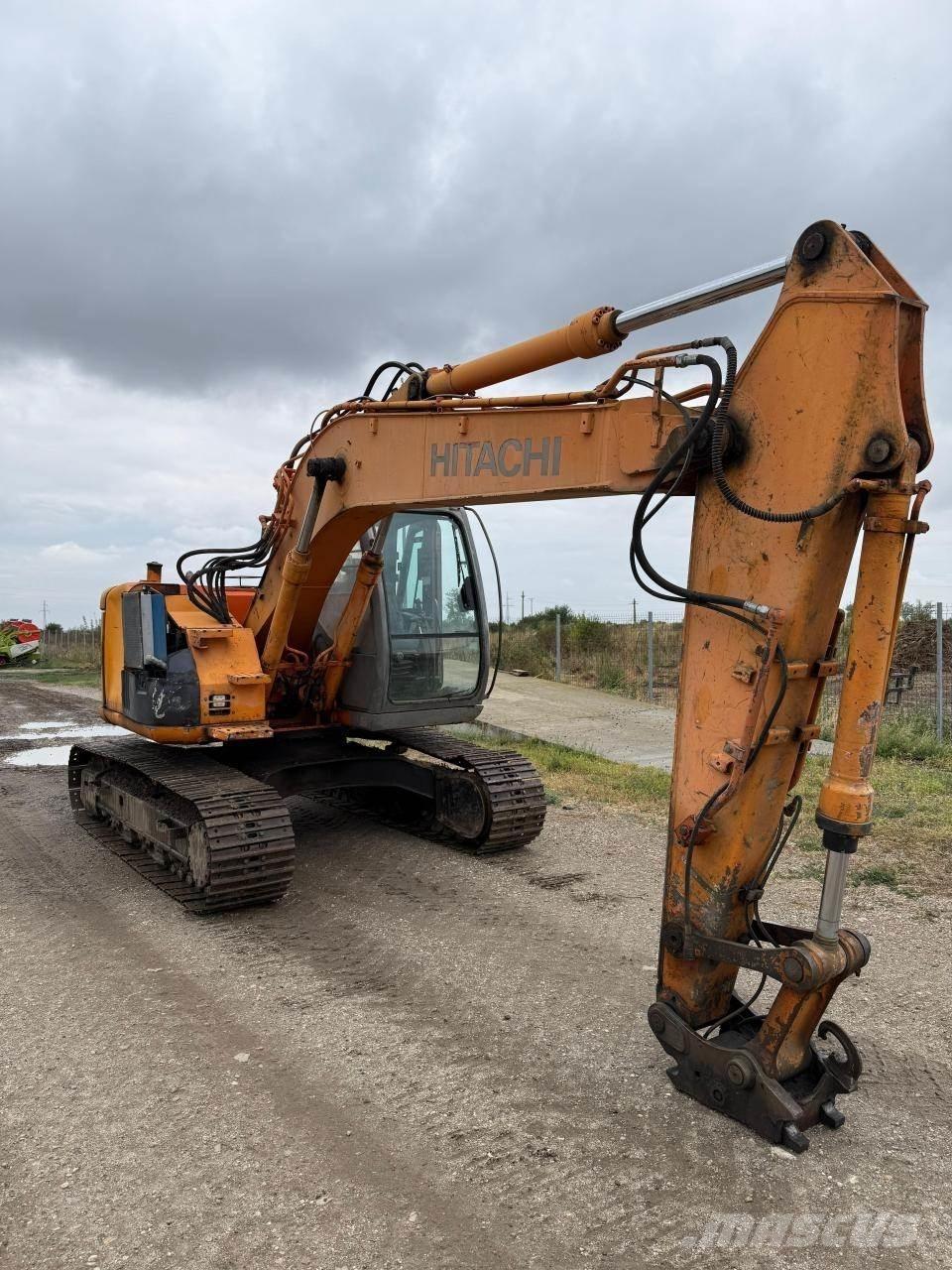 Hitachi ZX135US Гусеничні екскаватори