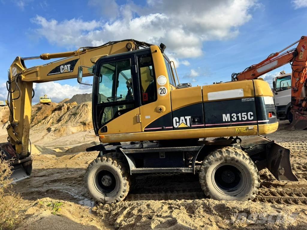 CAT M 315 C Колісні екскаватори