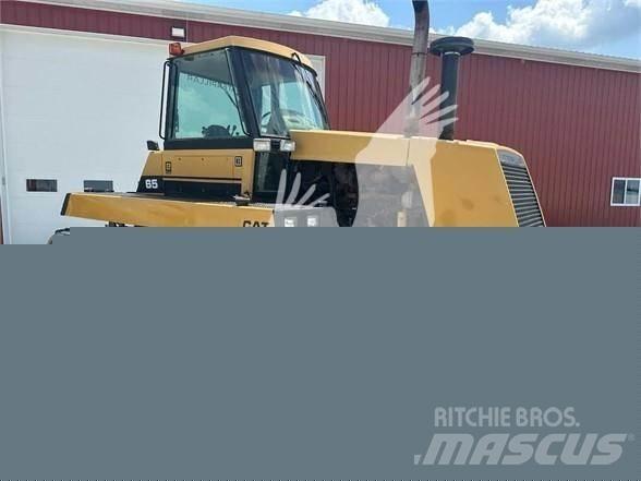 CAT CH65 Трактори
