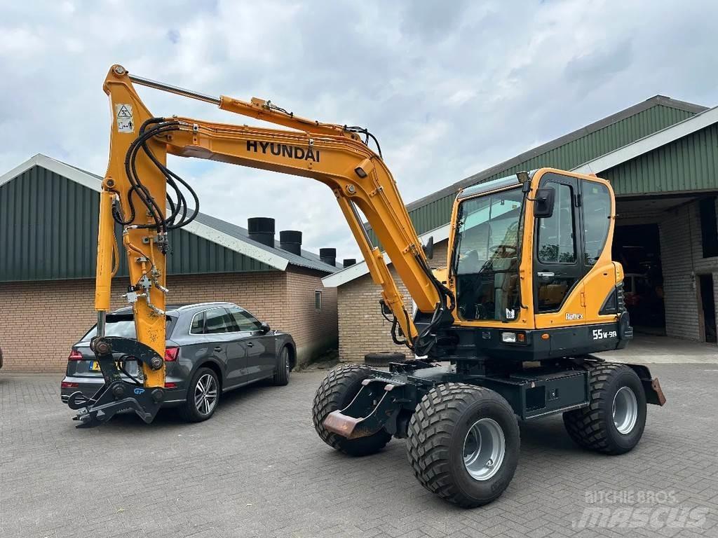 Hyundai 55W-9A Колісні екскаватори