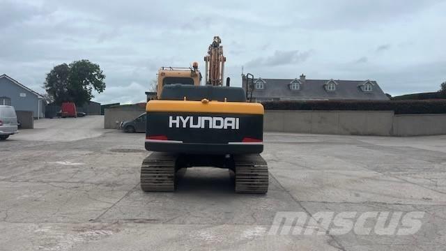 Hyundai 140LC Гусеничні екскаватори