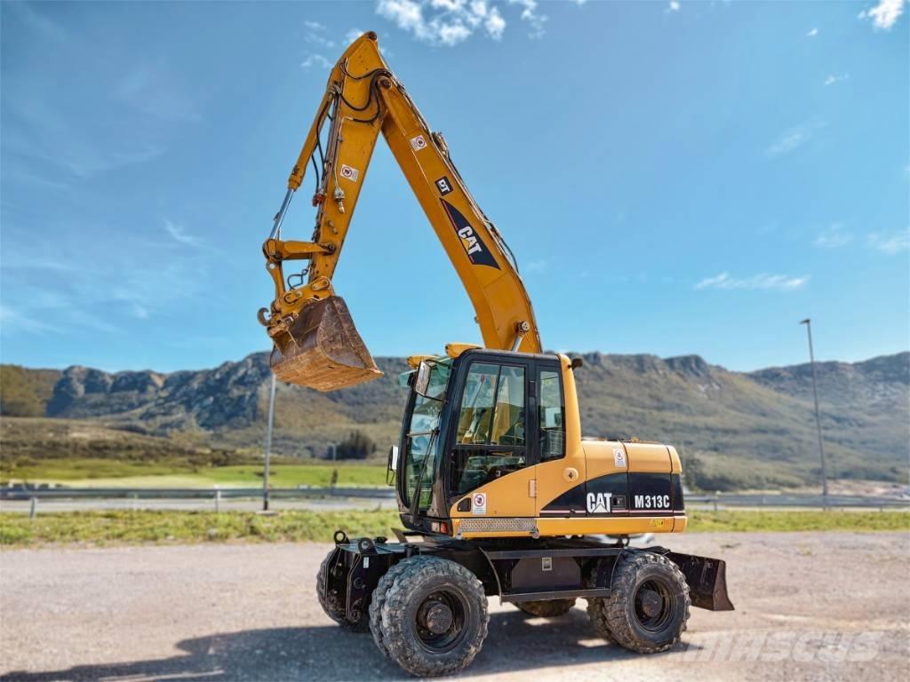 CAT M 313 C Колісні екскаватори