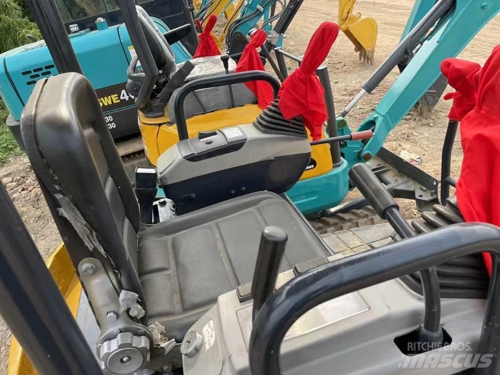 Komatsu PC18 Гусеничні екскаватори