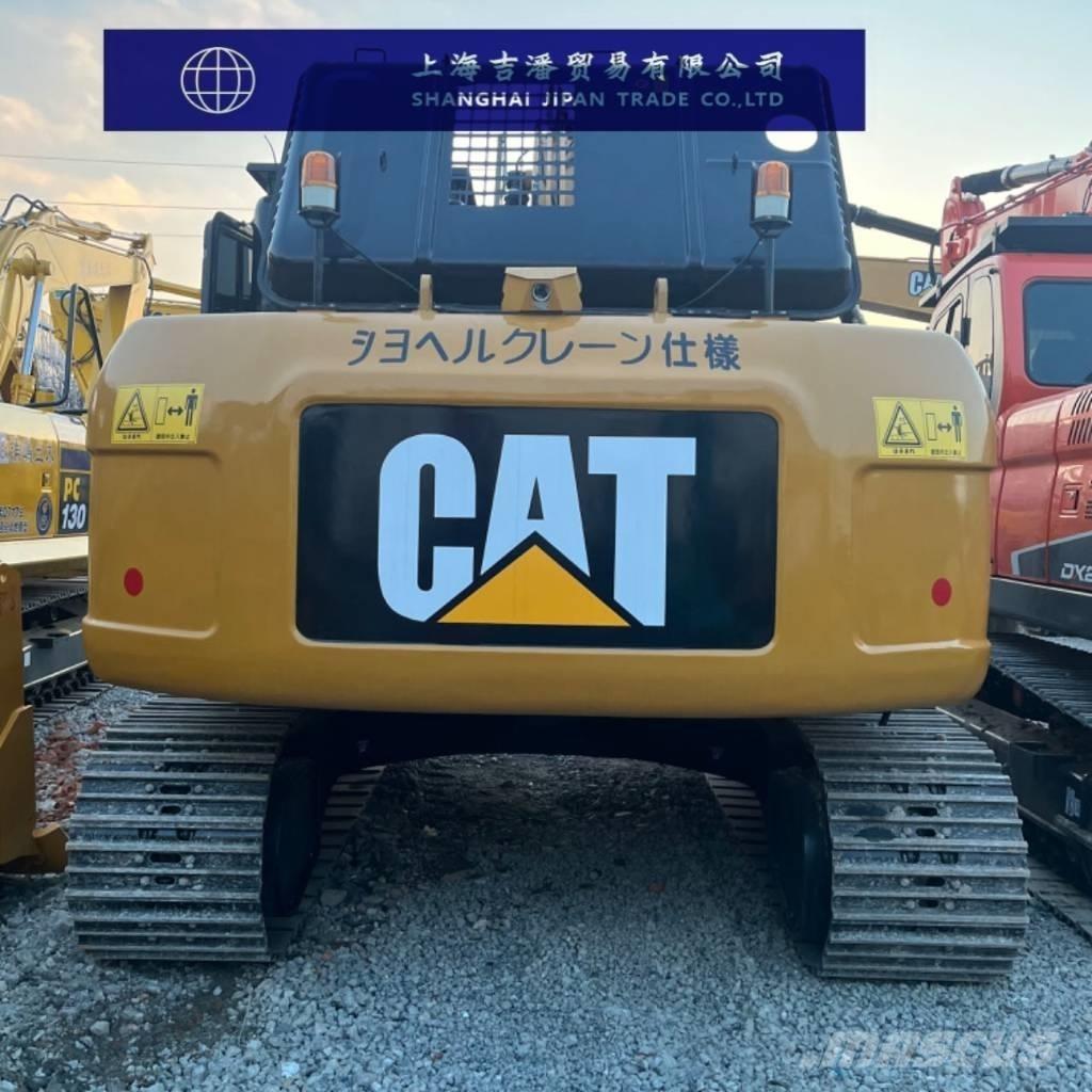 CAT 323 D Гусеничні екскаватори