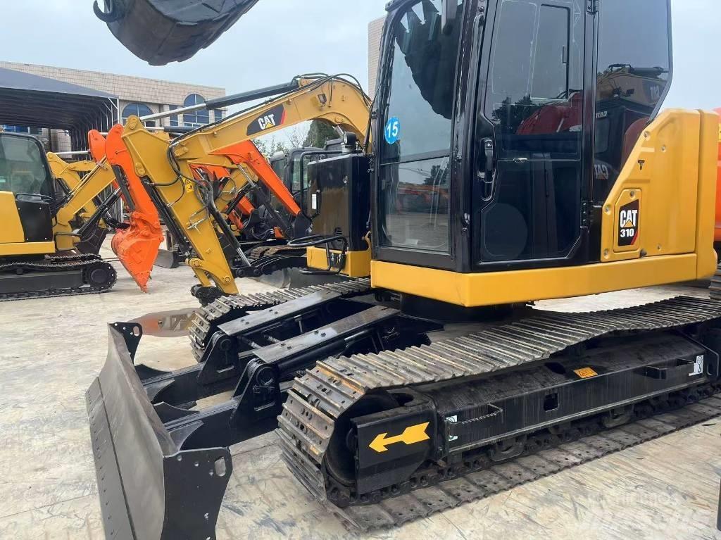 CAT 310 Гусеничні екскаватори