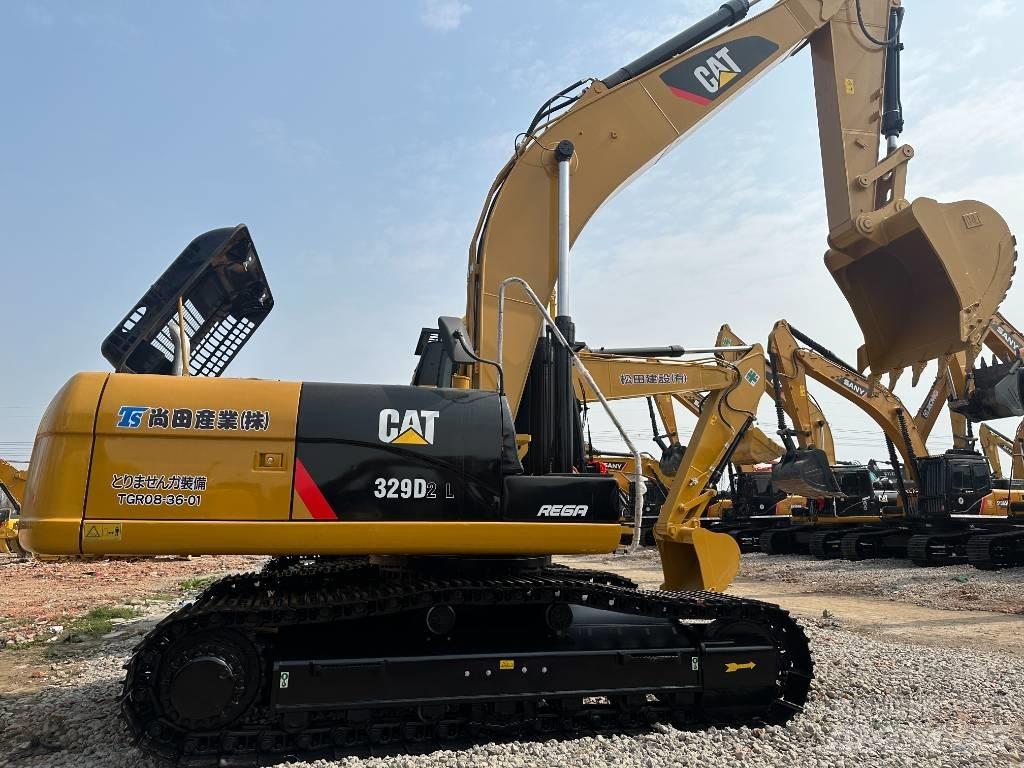 CAT 329D2 Середні екскаватори 7т. - 12т.