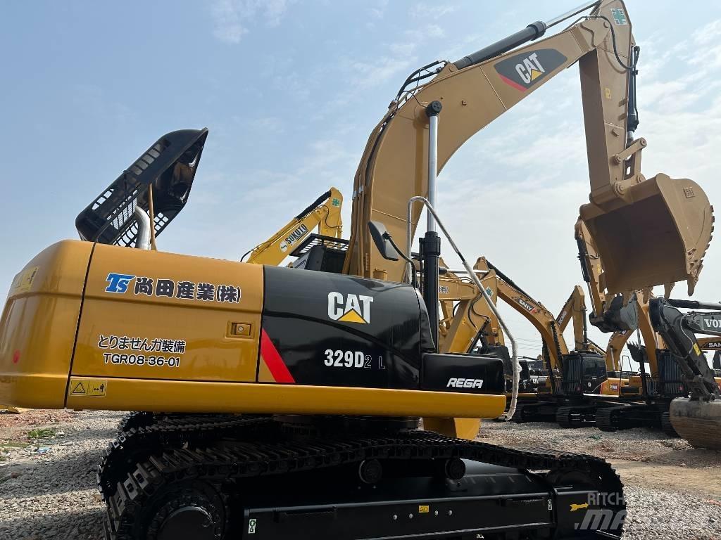 CAT 329D2 Середні екскаватори 7т. - 12т.