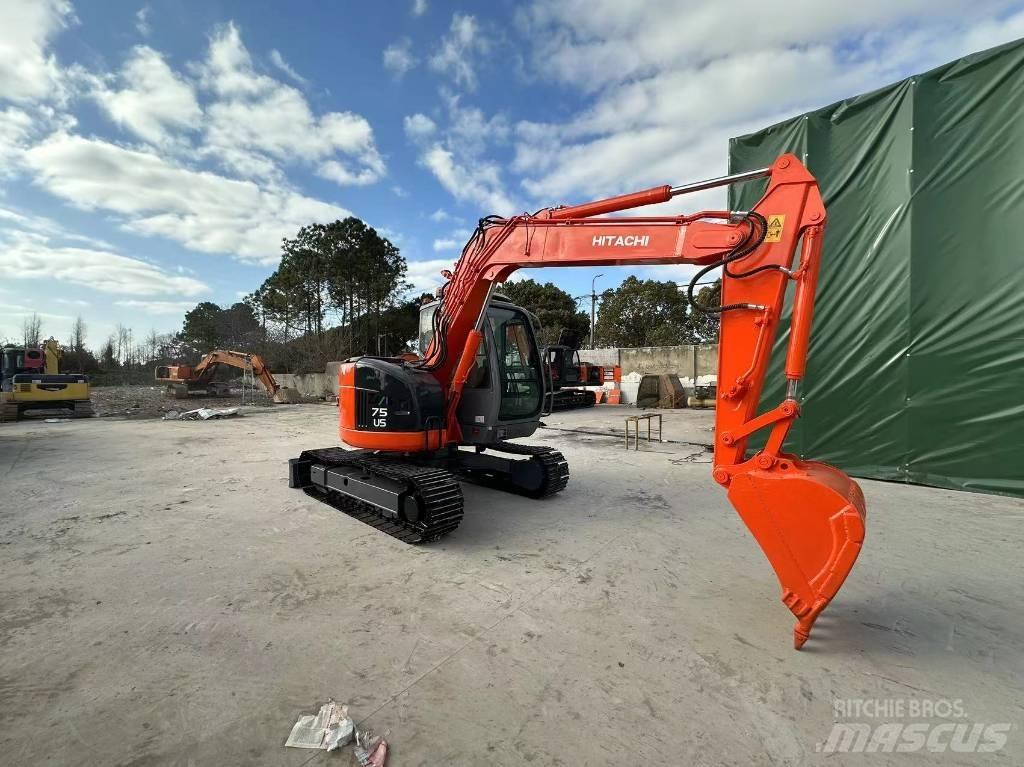 Hitachi ZX75US Міні-екскаватори < 7т