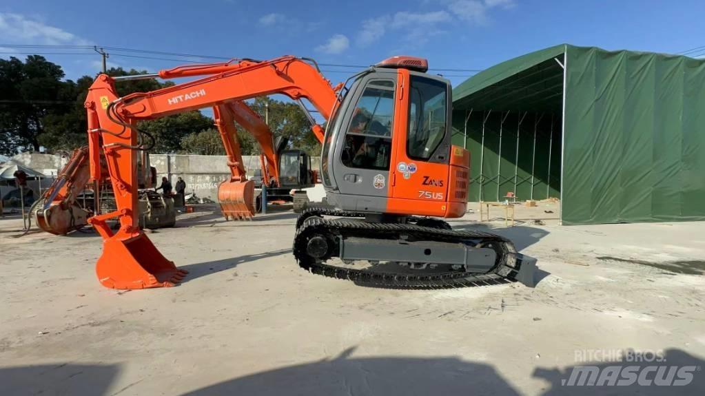 Hitachi ZX75US Міні-екскаватори < 7т