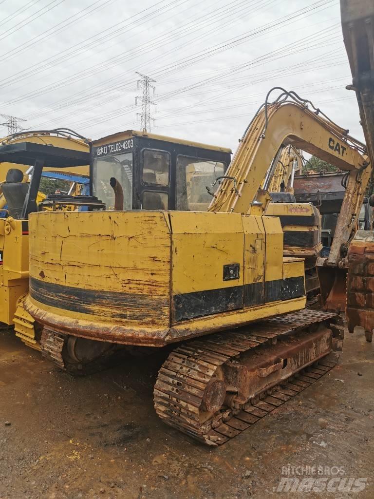 CAT E 70 B Гусеничні екскаватори