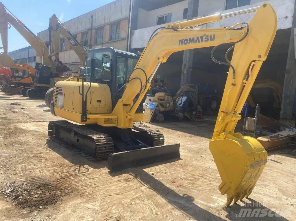 Komatsu PC56 Гусеничні екскаватори