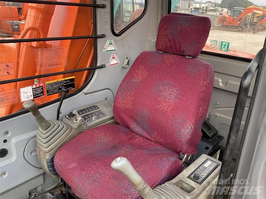 Hitachi EX60 Гусеничні екскаватори