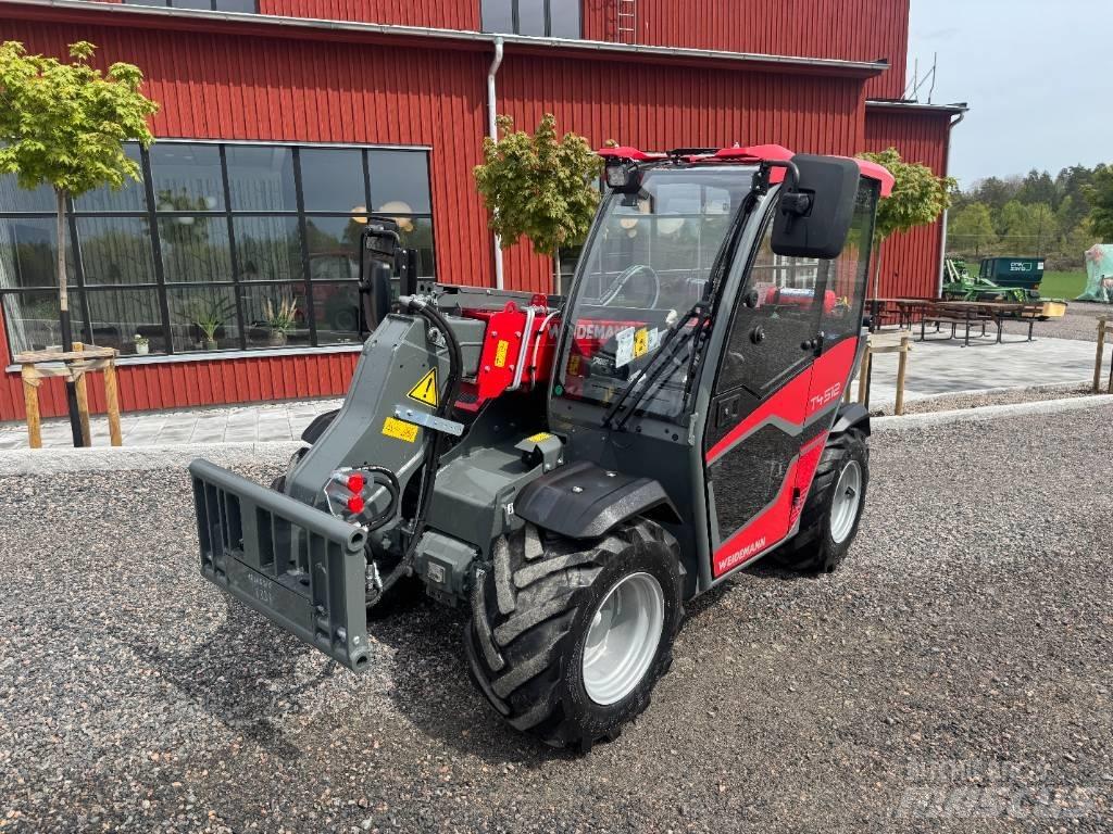 Weidemann T4512 Багатофункціональне обладнання для вантажних і землекопальних робіт