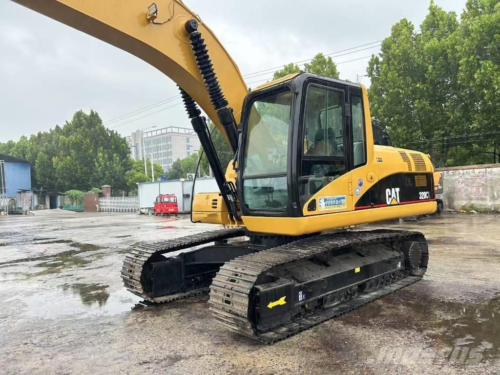 CAT 320 C Гусеничні екскаватори