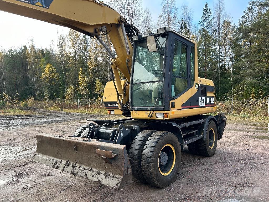 CAT M312 Фронтальні навантажувачі
