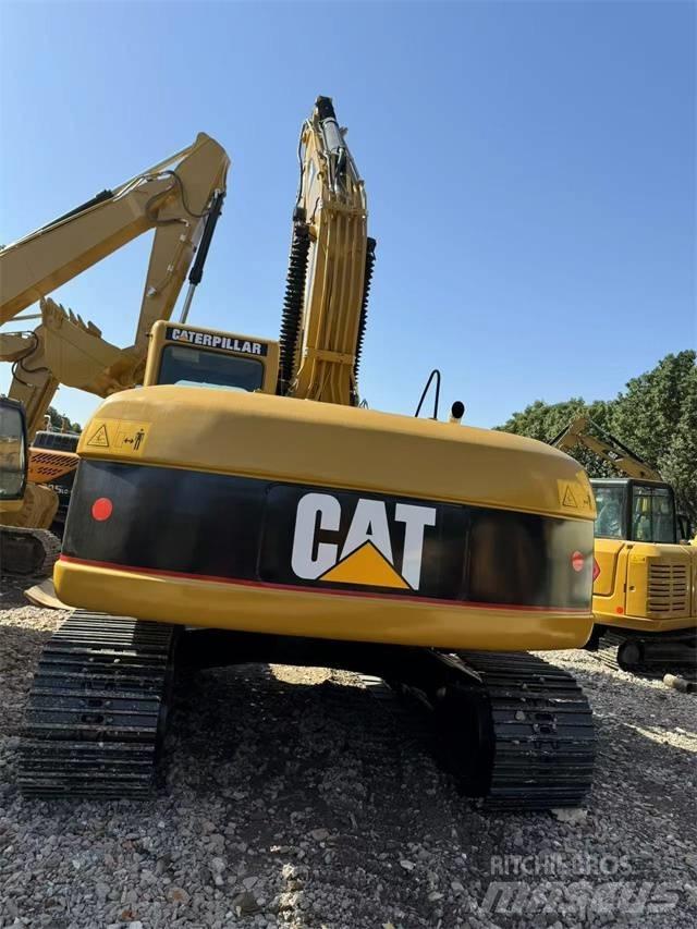 CAT 320 C Гусеничні екскаватори