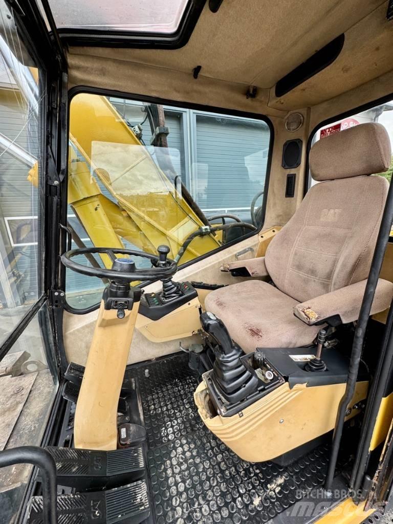 CAT M 315 Колісні екскаватори