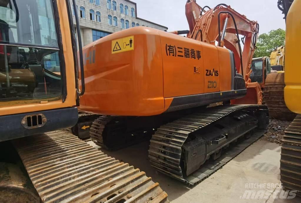 Hitachi ZX 210 Гусеничні екскаватори