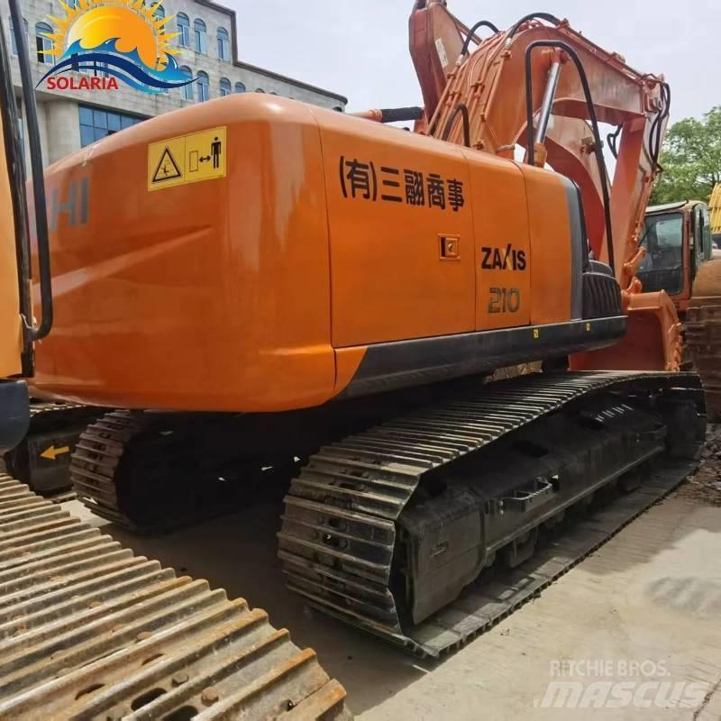 Hitachi ZX 210 Гусеничні екскаватори