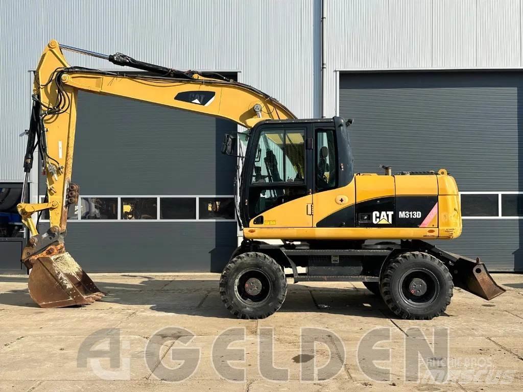 CAT M313D Колісні екскаватори