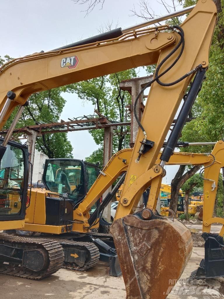 CAT 310 Гусеничні екскаватори