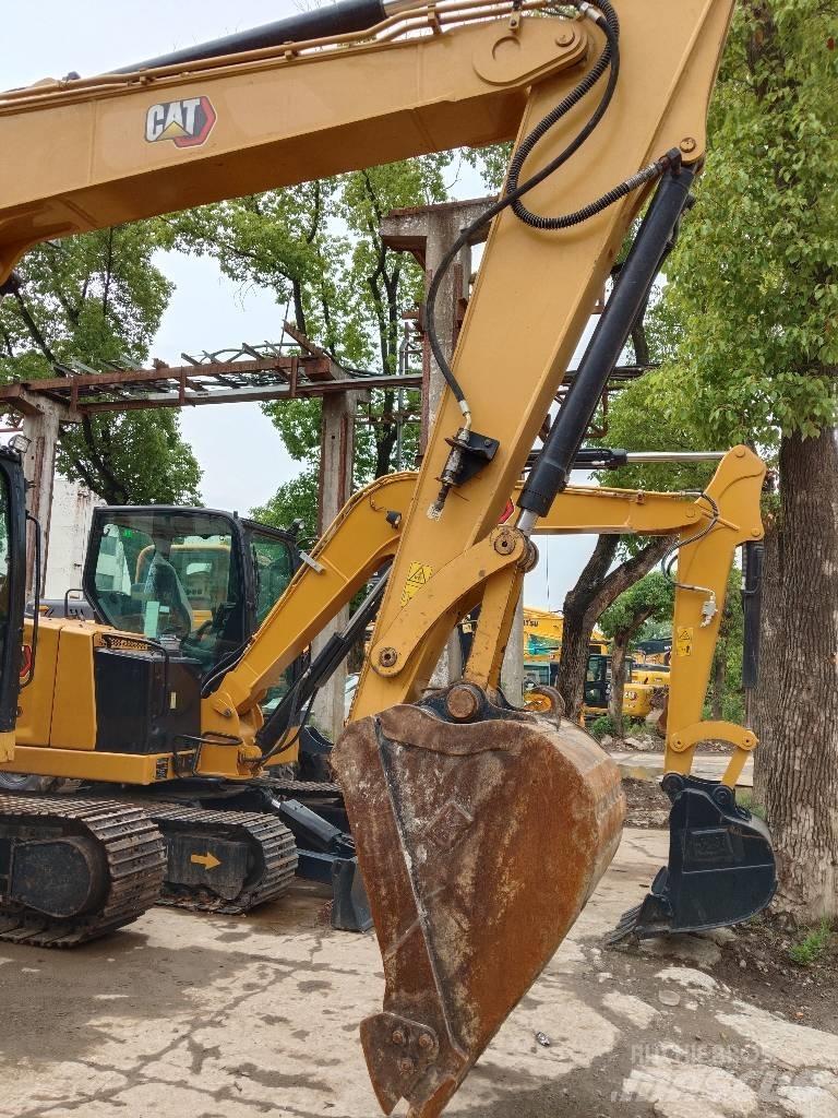 CAT 310 Гусеничні екскаватори