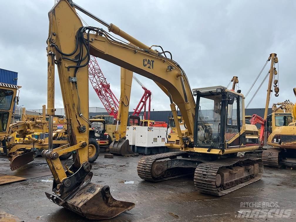 CAT 317 Гусеничні екскаватори