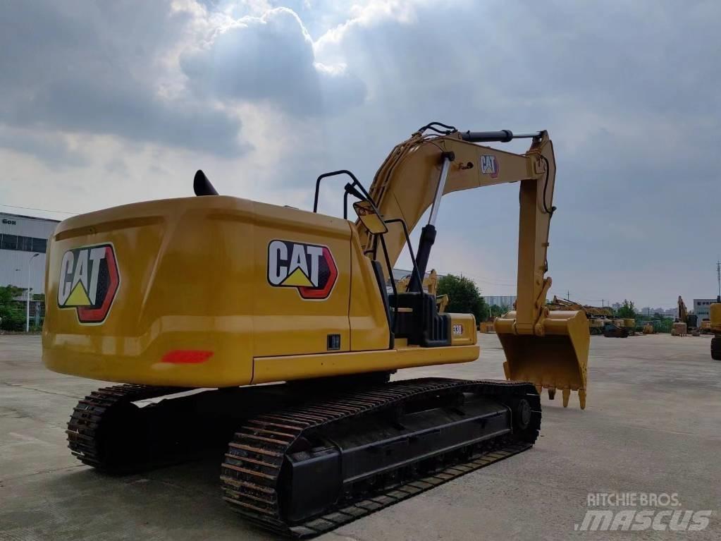 CAT 330 Гусеничні екскаватори