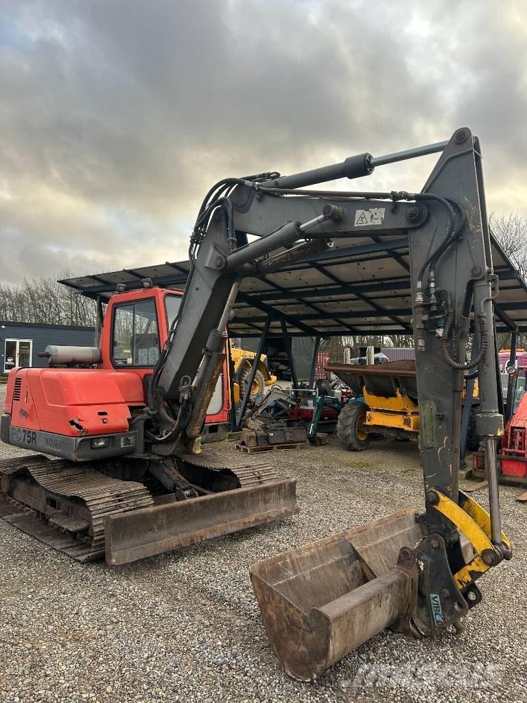 Komatsu PC 75 Середні екскаватори 7т. - 12т.